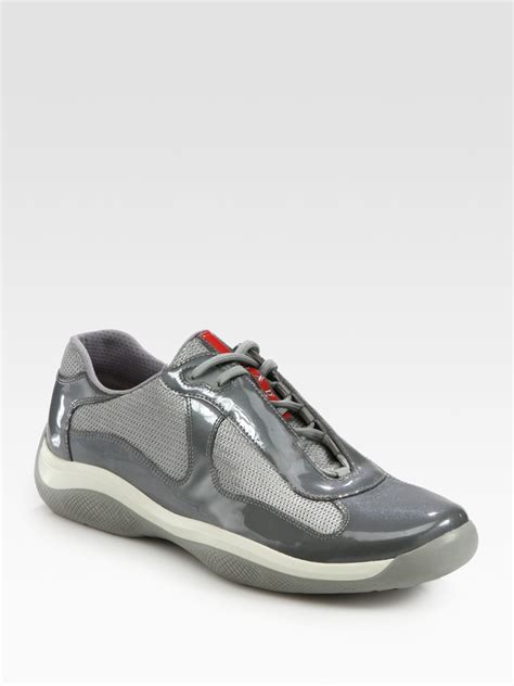 grey prada sneakers.